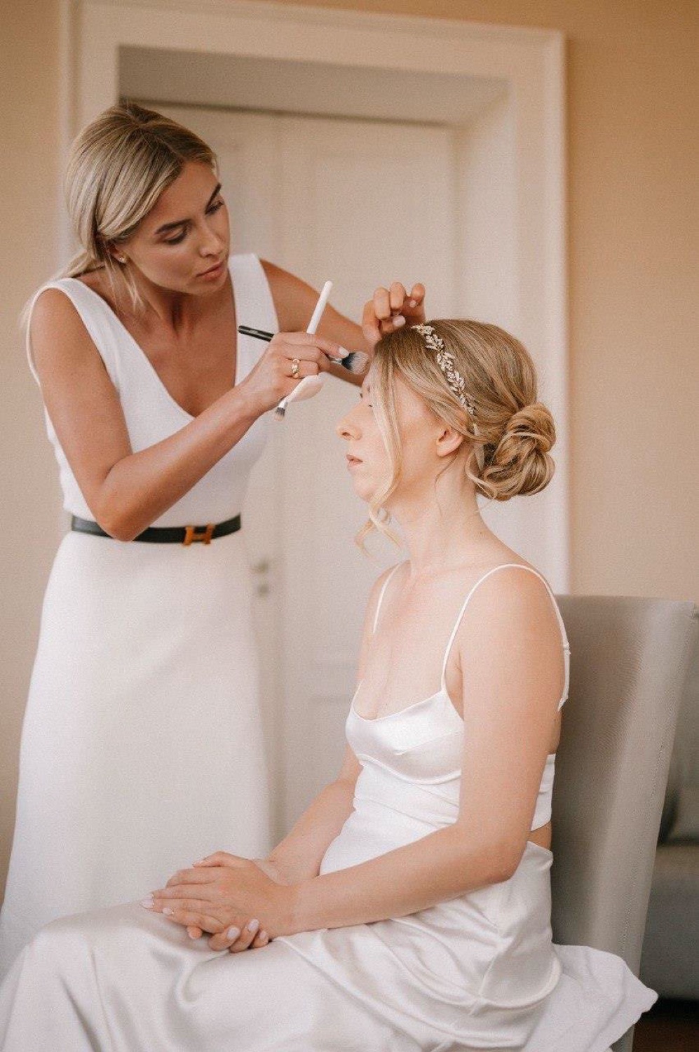 Make-up artist at work on a bride