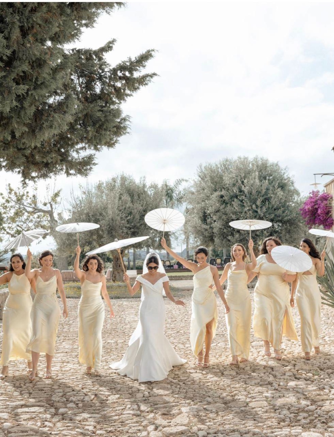 Bridesmaids with parasols
